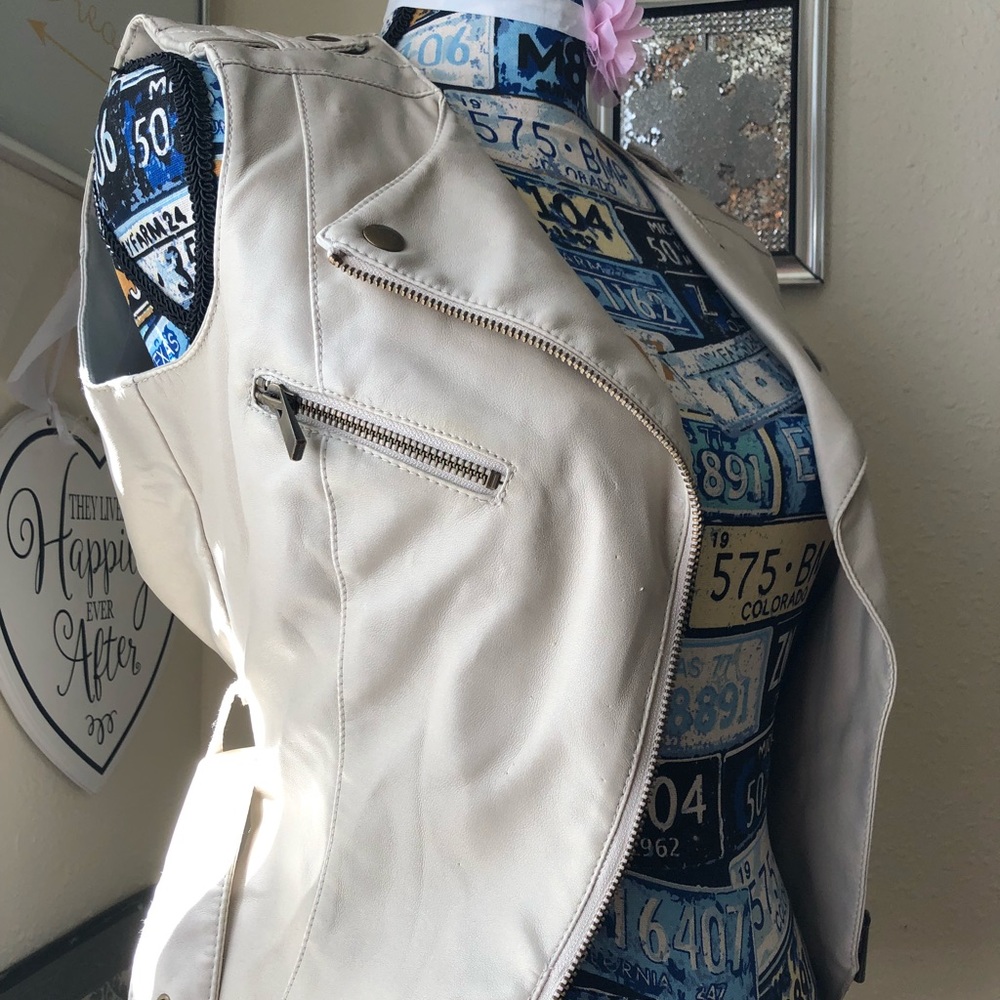 Leather vest.